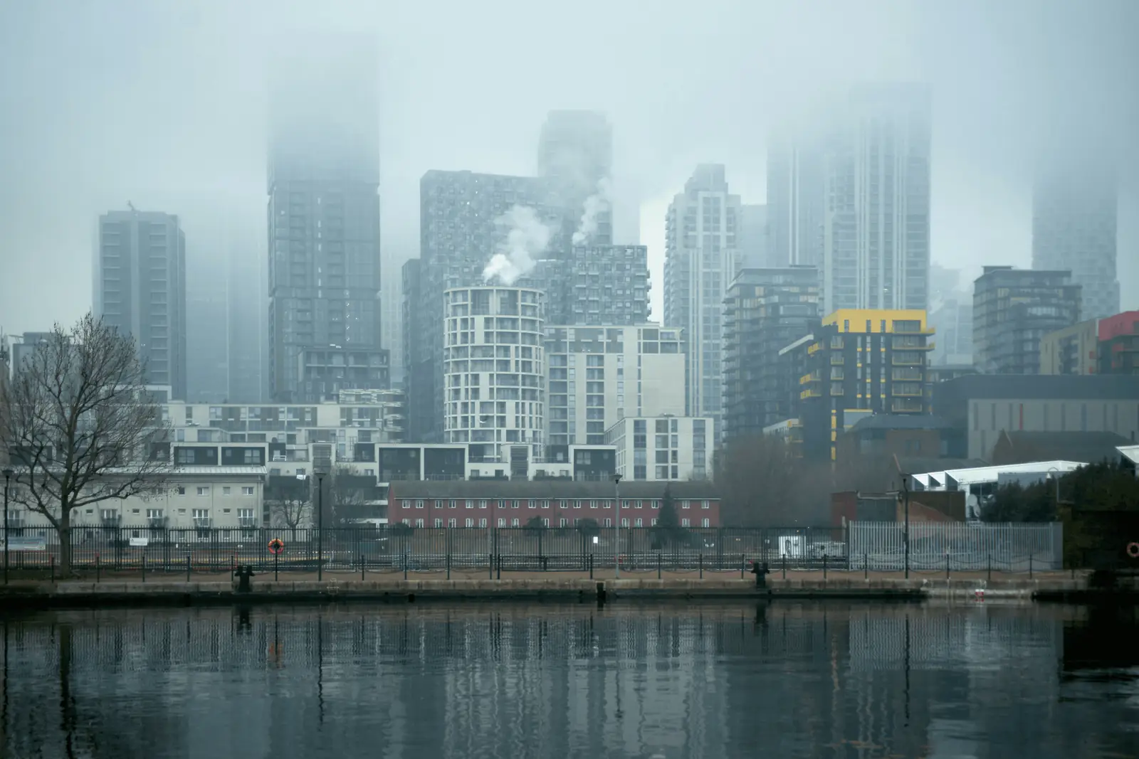 Coastal city skyline in smog